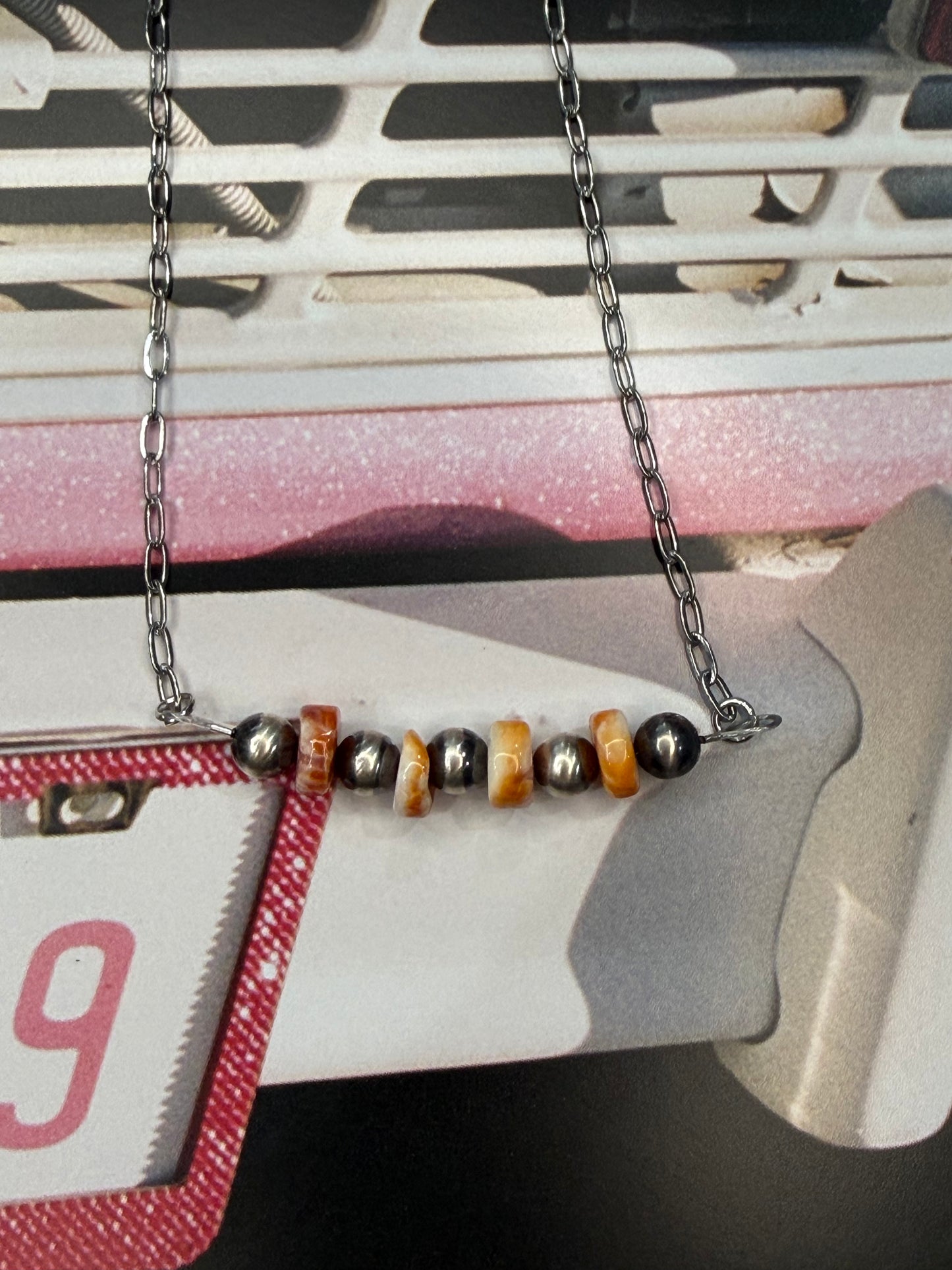 Orange spiny bar necklace