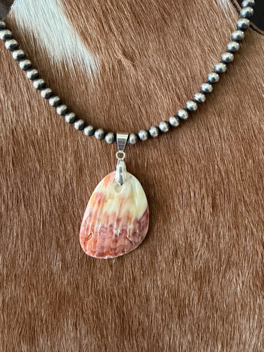 Orange spiny shell pendant
