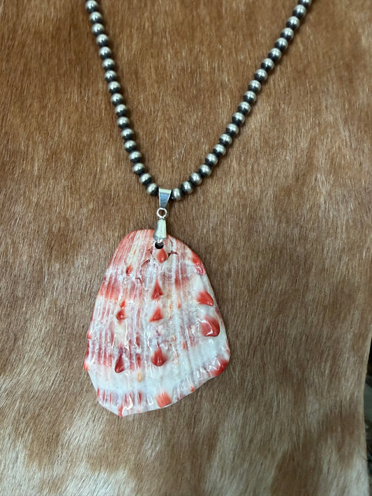 Orange spiny shell pendant