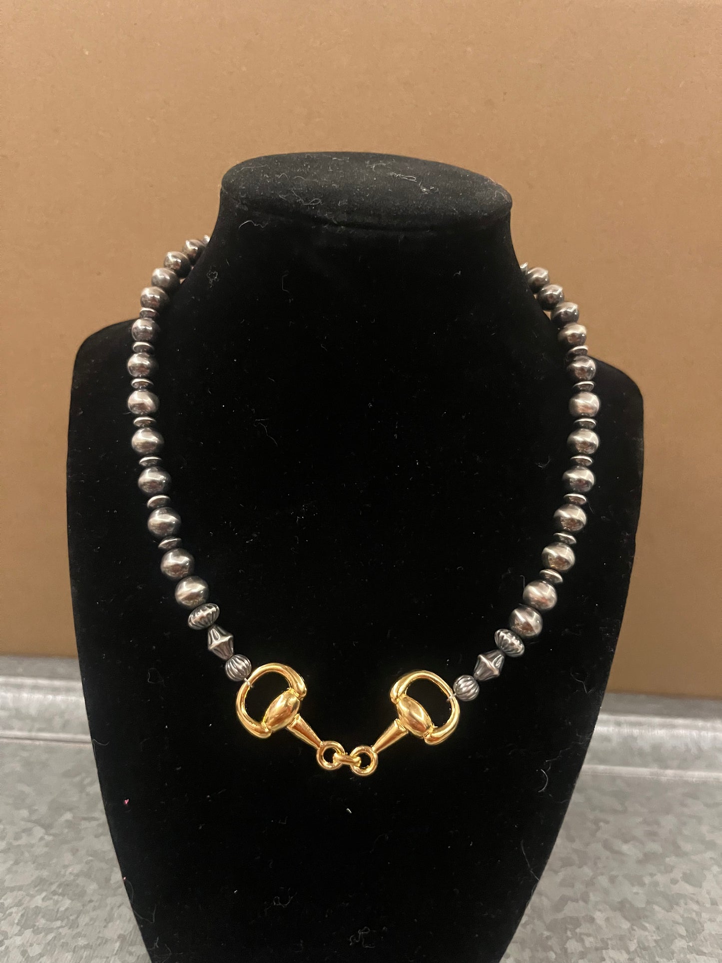 The Gold Snaffle Bit