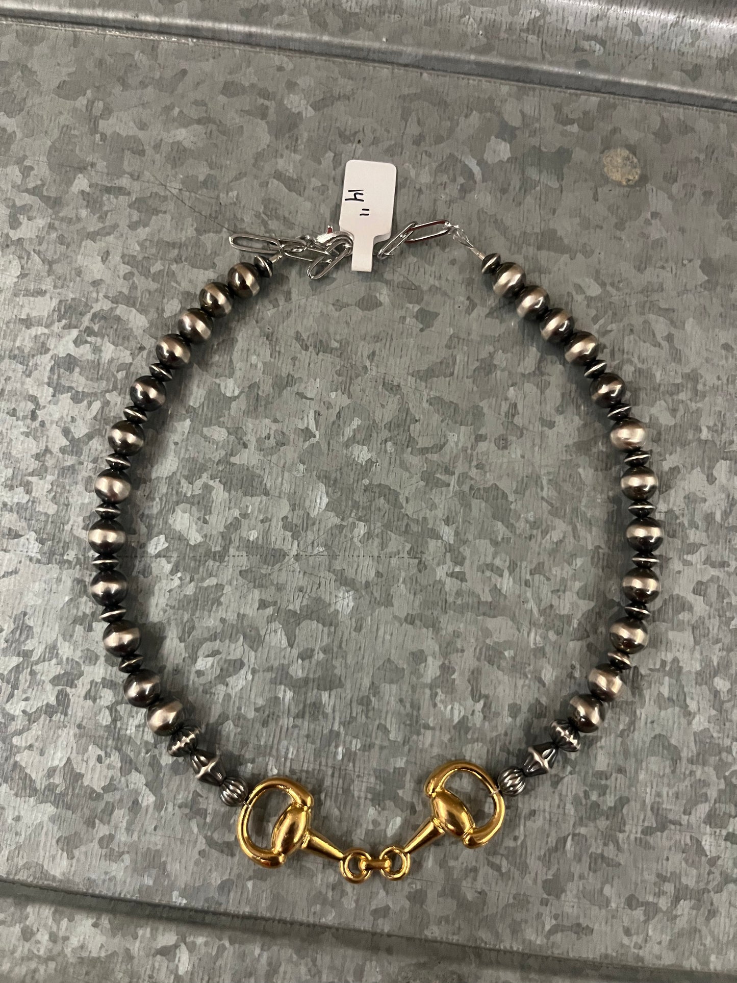 The Gold Snaffle Bit
