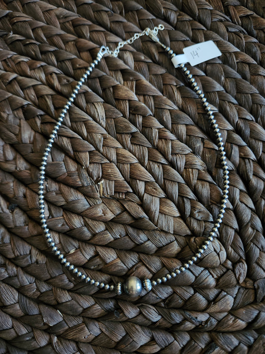 Plain pearl necklace
