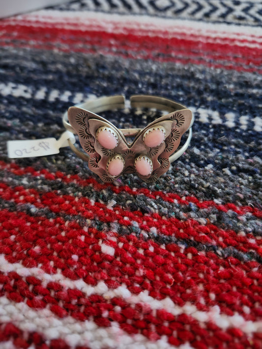 Pink conch butterfly cuff